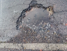 Sat 2nd<br/>our street pothole gets deeper